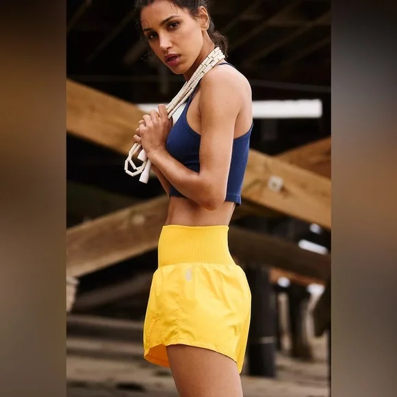 Free People Movement Carpe Diem Shorts in Yellow. - Picture 5 of 6